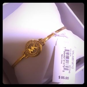 Micheal kors woman's Mk logo gold tone bracelet